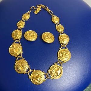 Vintage zodiac Fendi Gold necklace and clasp earrings. From the 1980’s